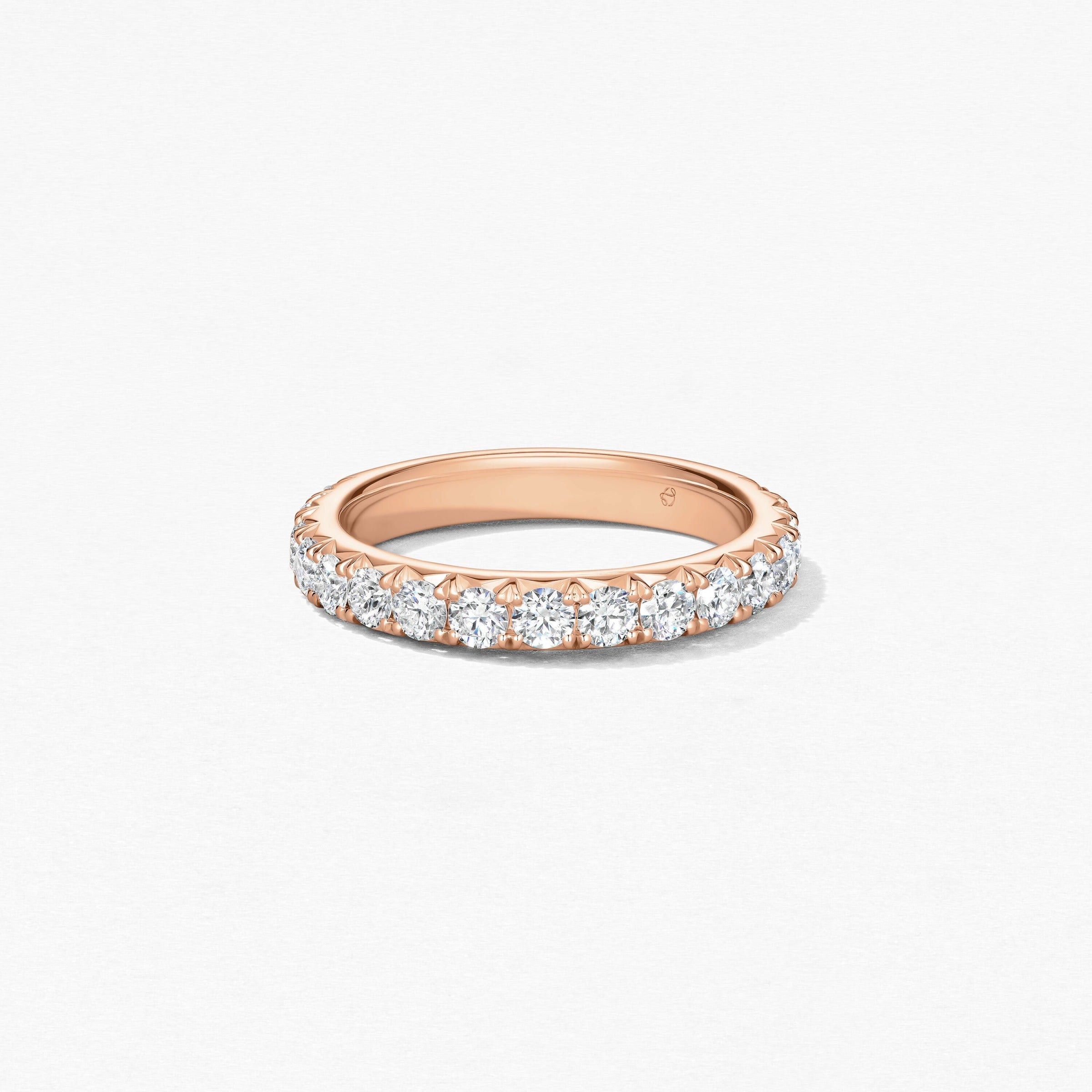18KR T=.33CT G-HVS1A+ VELA FRENCH PAVE BAND