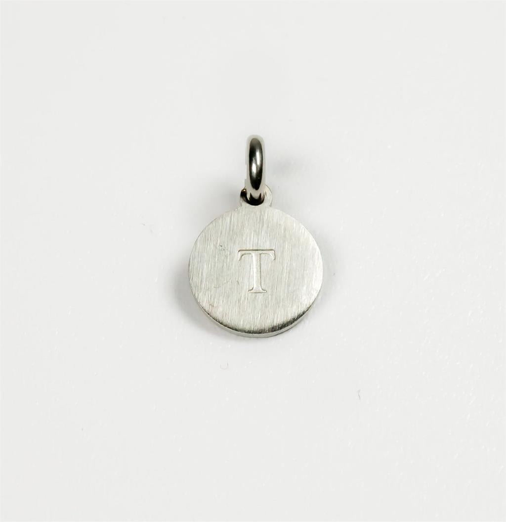 "T" CHARM