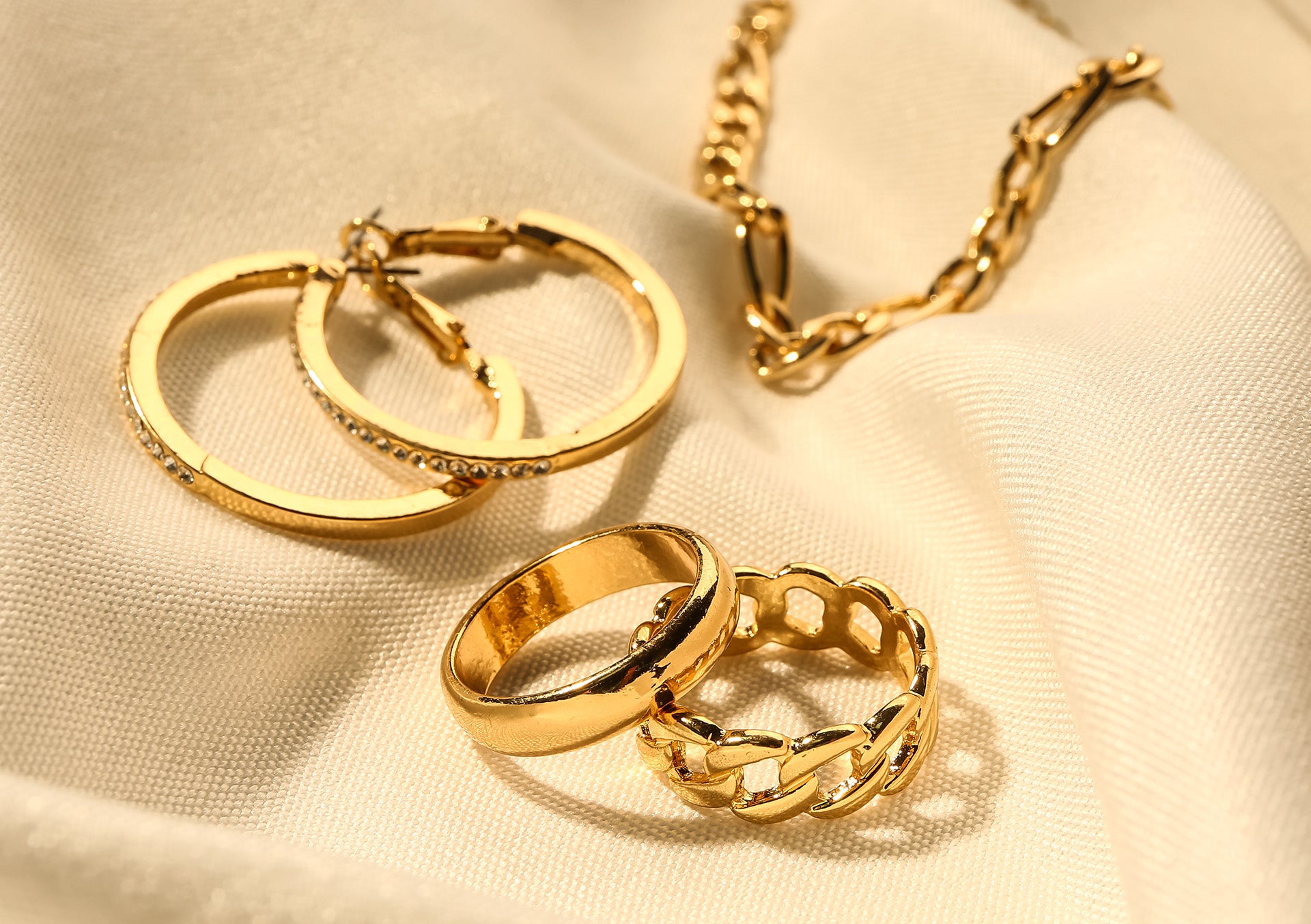 Gold Rings, Earrings, and a Necklace